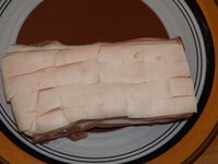 02_Schweinebauch_eingeschnitten.jpg 02_Schweinebauch_eingeschnitten.jpg