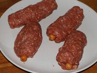 03_Würstchen_im_Hackmantel.jpg 03_Würstchen_im_Hackmantel.jpg